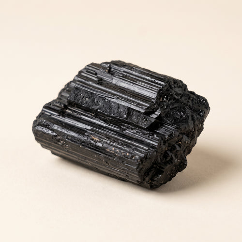Raw black tourmaline chunk with natural striations