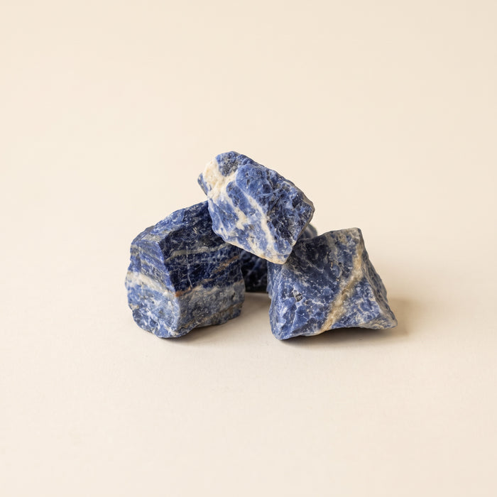 Natural rough blue sodalite stones with white veins