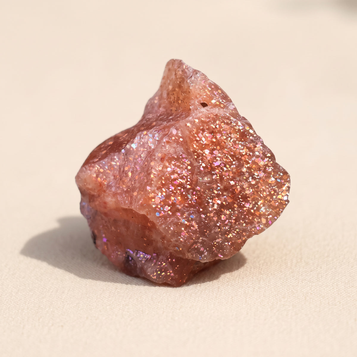 Real photo of a raw sunstone piece