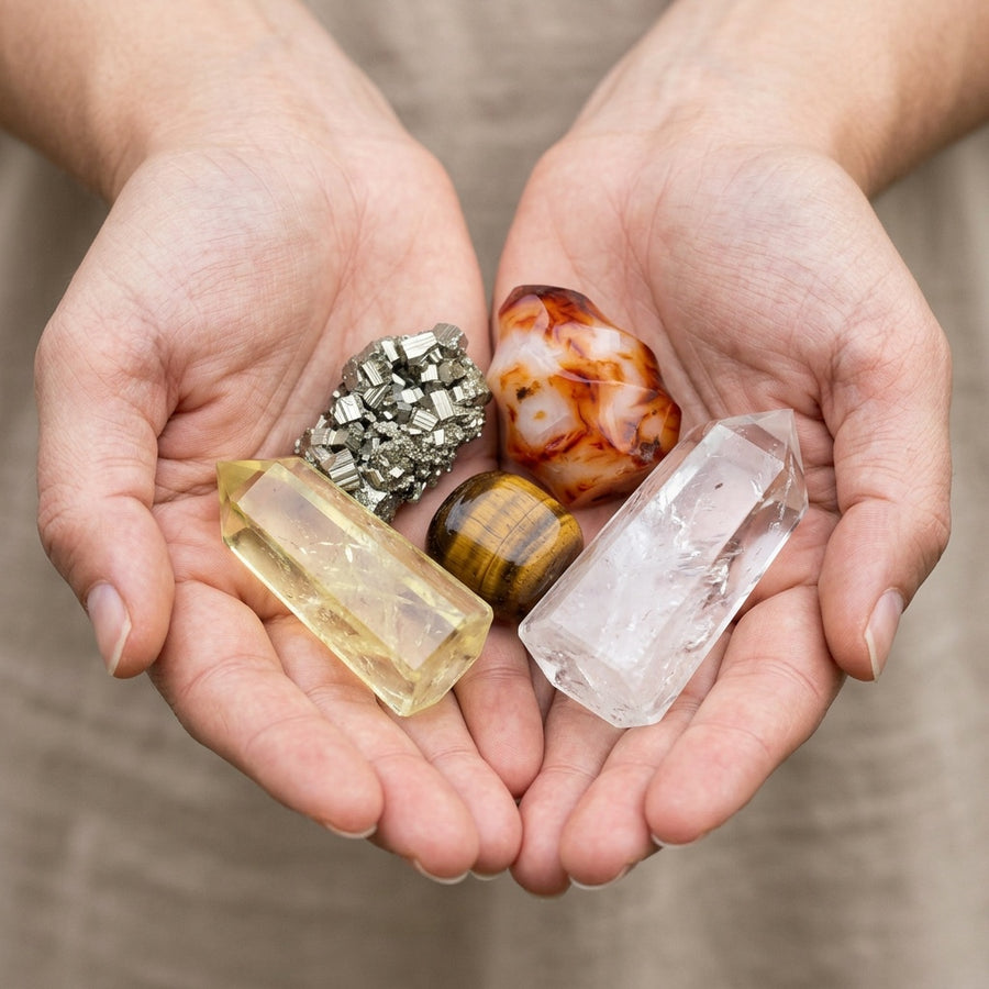 The Ambition Altar stones held in cupped hands to show size