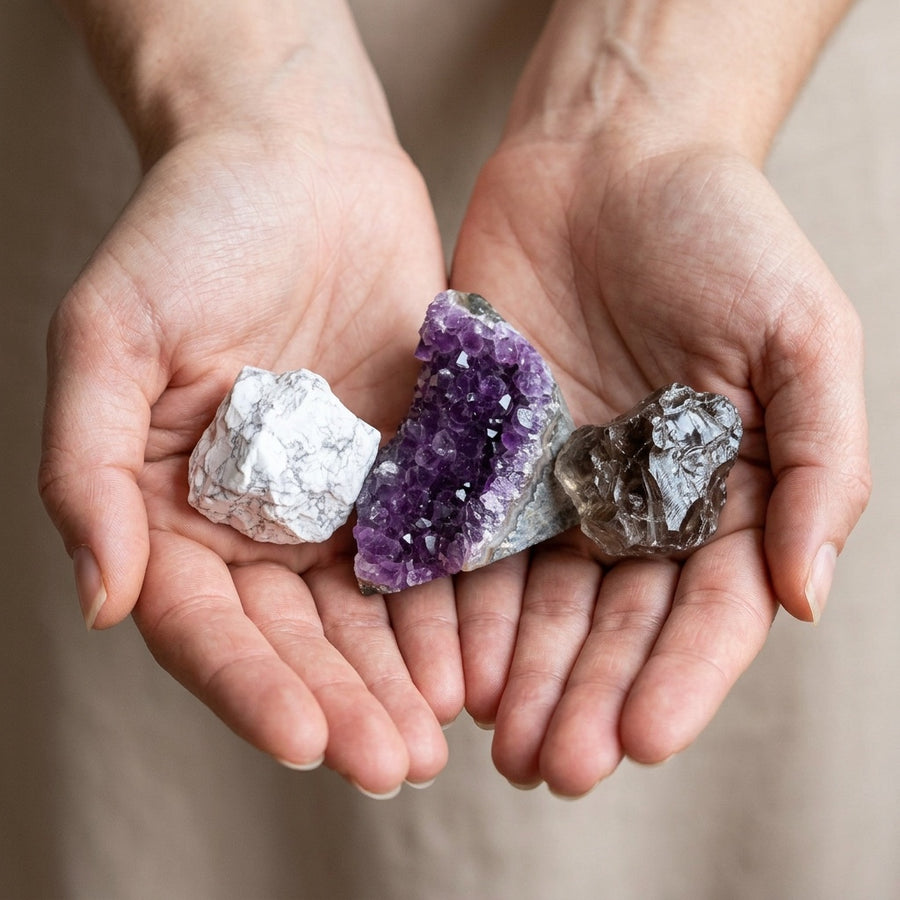 The Wind-Down Ritual stones held in cupped hands to show size