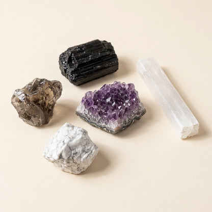 The Full Reset crystal set: black tourmaline, smoky quartz, amethyst, howlite and selenite