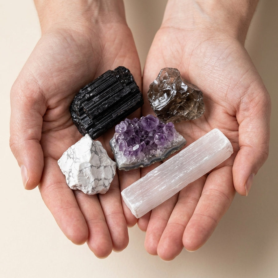 The Full Reset stones held in cupped hands to show size