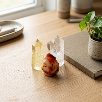 The Momentum Stack stones on a light oak desk